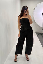 Load image into Gallery viewer, Pleated Strapless Peplum Barrel Jumpsuit- Black

