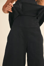 Load image into Gallery viewer, Pleated Strapless Peplum Barrel Jumpsuit- Black
